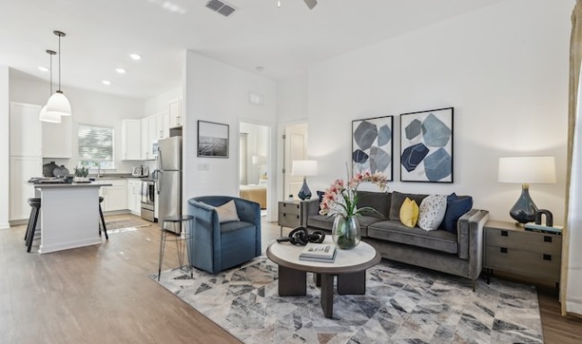 Bungalow living room with modern furnishings at The Tides at Waterside